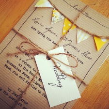 Must-be-Fete-brown-with-yellow-gold-bunting-wedding-invitation